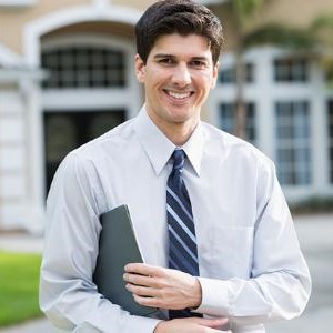Happy man selling a house